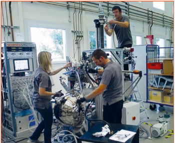 Three technicians working on a Scienta Omicron system  | © Scienta Omicron 