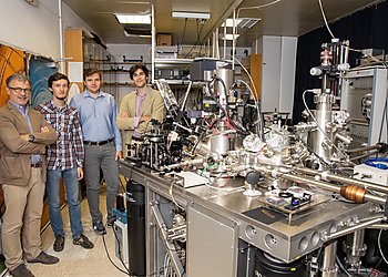 Team of people standing with the LT Nanoprobe System  | © Jozef Stefan Institute